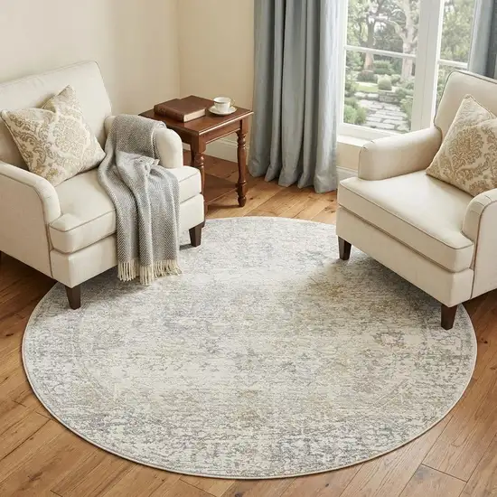 6' Ivory And Beige Abstract Round Rug Photo 1