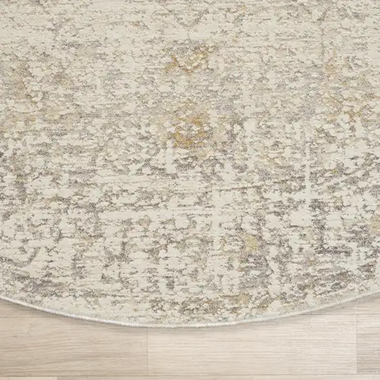 6' Ivory And Beige Abstract Round Rug Photo 5