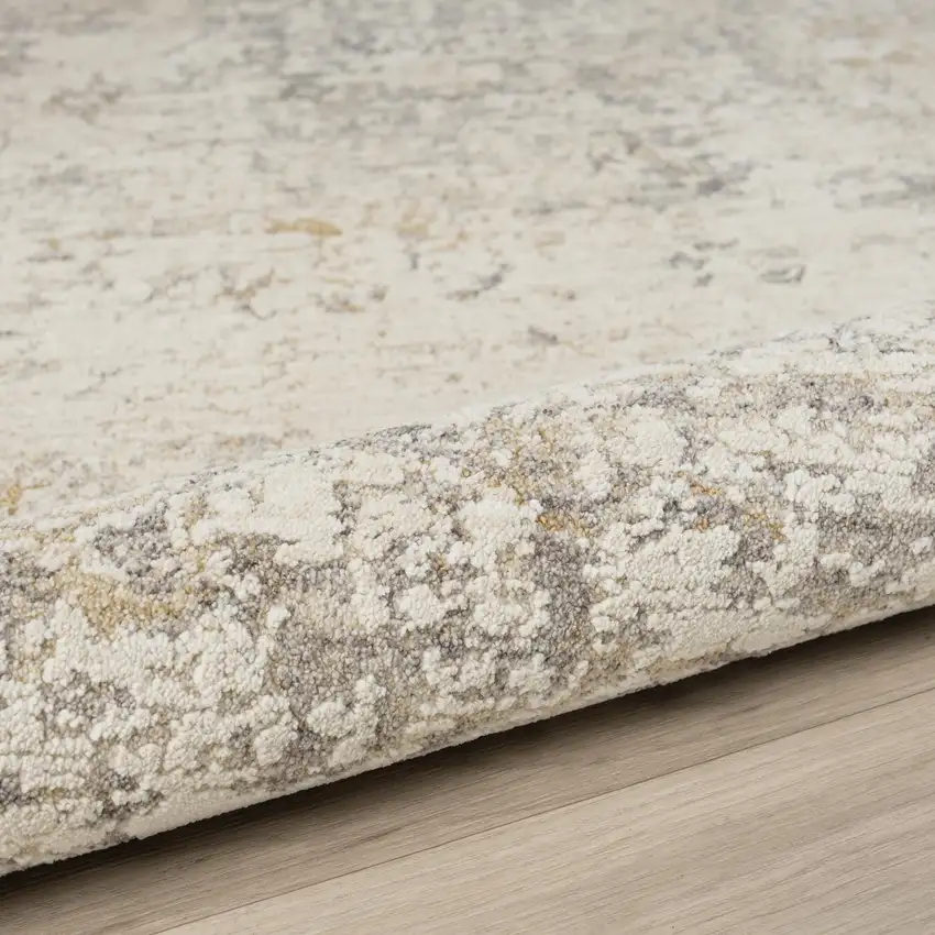 6' Ivory And Beige Abstract Round Rug Photo 4