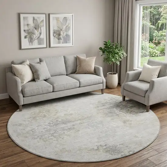 8' Ivory And Beige Abstract Washable Round Rug With UV Protection Photo 1