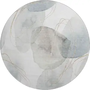 Photo of 8' Ivory And Beige Abstract Washable Round Rug With UV Protection