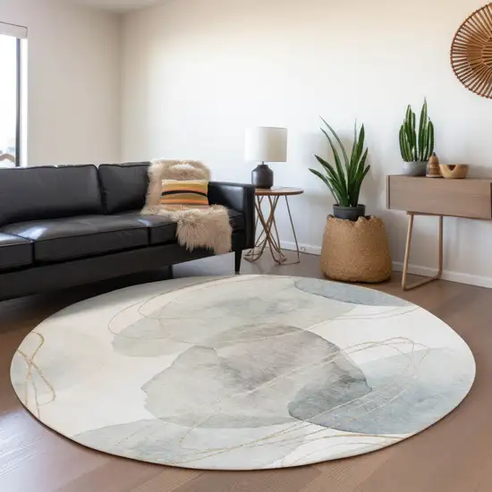 8' Ivory And Beige Abstract Washable Round Rug With UV Protection Photo 5