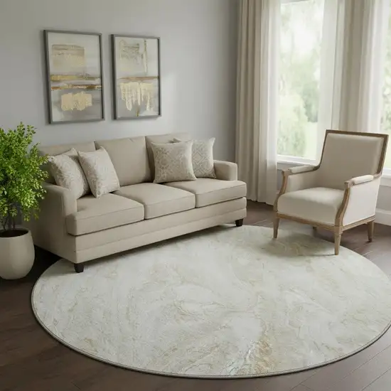 8' Ivory And Beige Abstract Washable Round Rug With UV Protection Photo 1