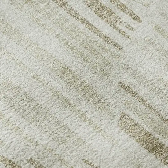 8' Ivory And Beige Abstract Washable Round Rug With UV Protection Photo 9