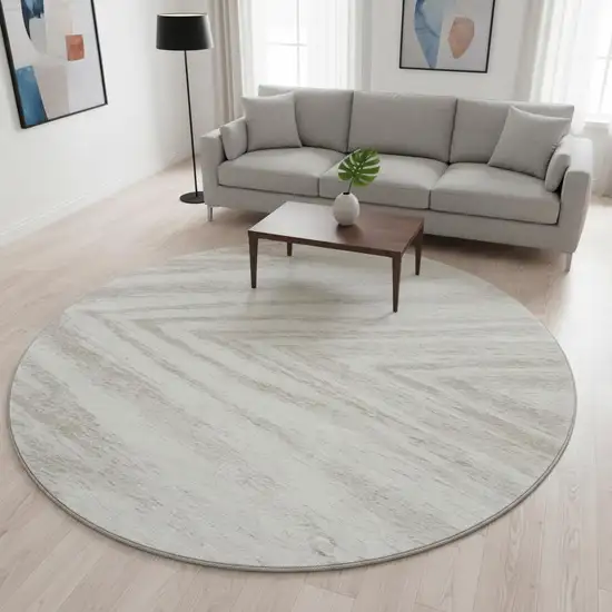 8' Ivory And Beige Abstract Washable Round Rug With UV Protection Photo 2