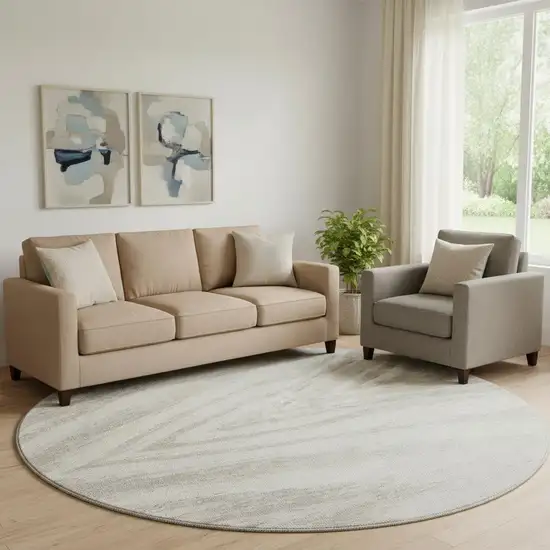 8' Ivory And Beige Abstract Washable Round Rug With UV Protection Photo 1