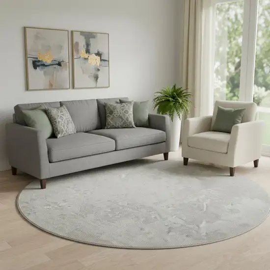 8' Ivory And Beige Abstract Washable Round Rug With UV Protection Photo 1