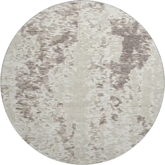 8' Ivory And Beige Abstract Washable Round Rug With UV Protection Photo 1