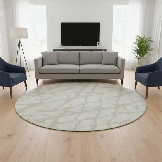 8' Ivory And Beige Abstract Washable Round Rug With UV Protection Photo 2