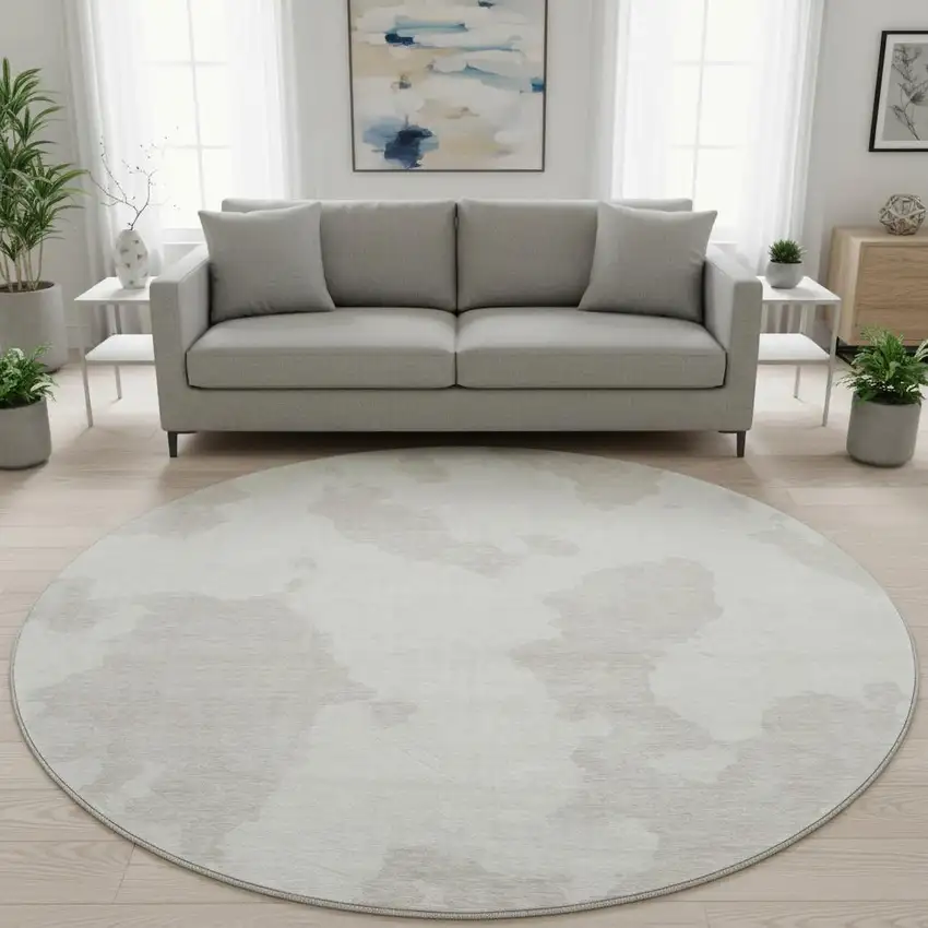 8' Ivory And Beige Abstract Washable Round Rug With UV Protection Photo 2