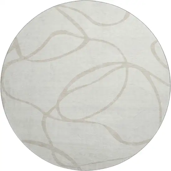 8' Ivory And Beige Abstract Washable Round Rug With UV Protection Photo 1