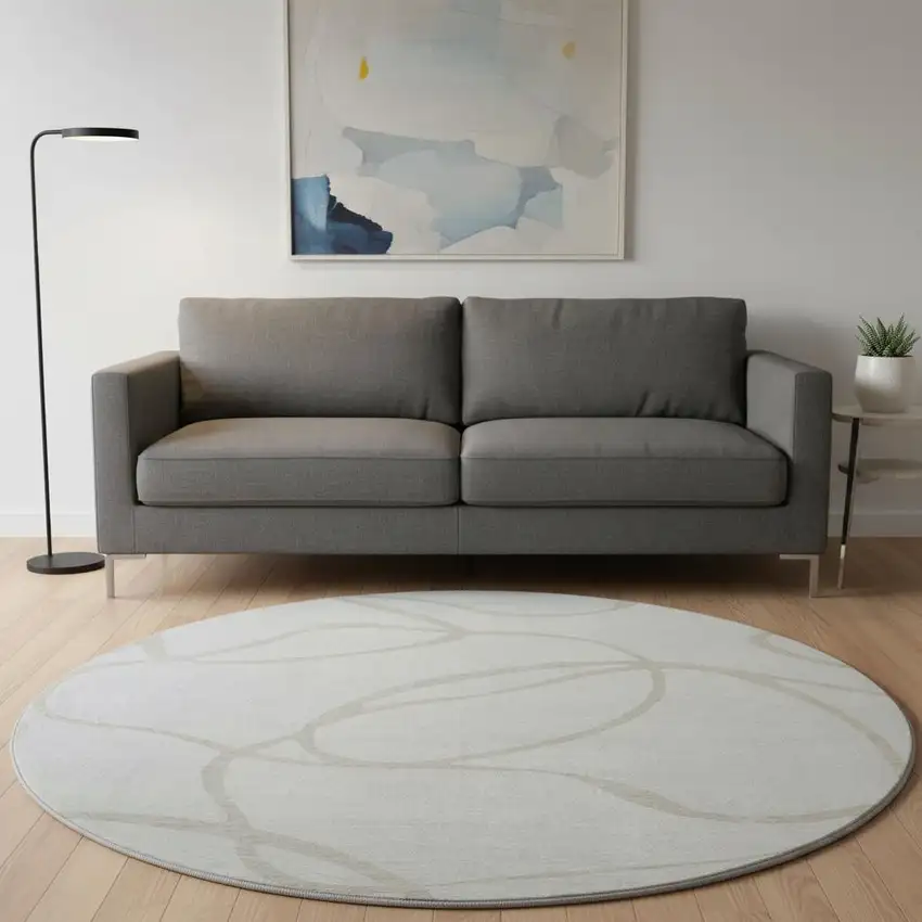 8' Ivory And Beige Abstract Washable Round Rug With UV Protection Photo 2