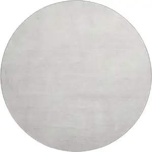 Photo of 8' Ivory And Beige Abstract Washable Round Rug With UV Protection