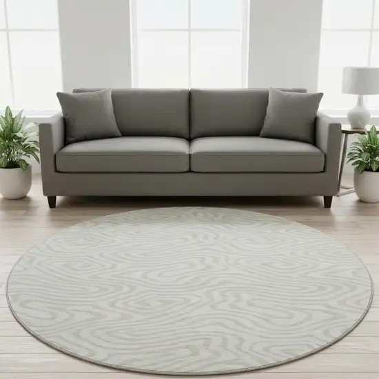 8' Ivory And Beige Abstract Washable Round Rug With UV Protection Photo 2