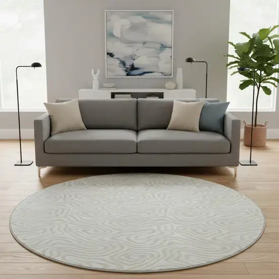 8' Ivory And Beige Abstract Washable Round Rug With UV Protection Photo 2