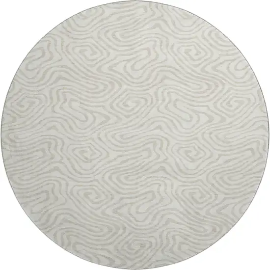 8' Ivory And Beige Abstract Washable Round Rug With UV Protection Photo 1