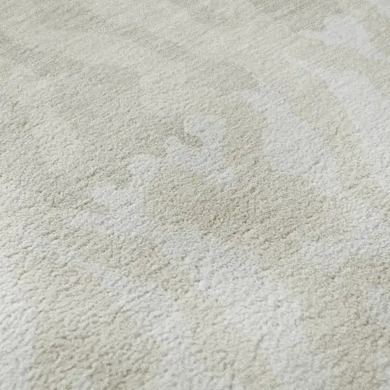 8' Ivory And Beige Animal Print Washable Round Rug With UV Protection Photo 9