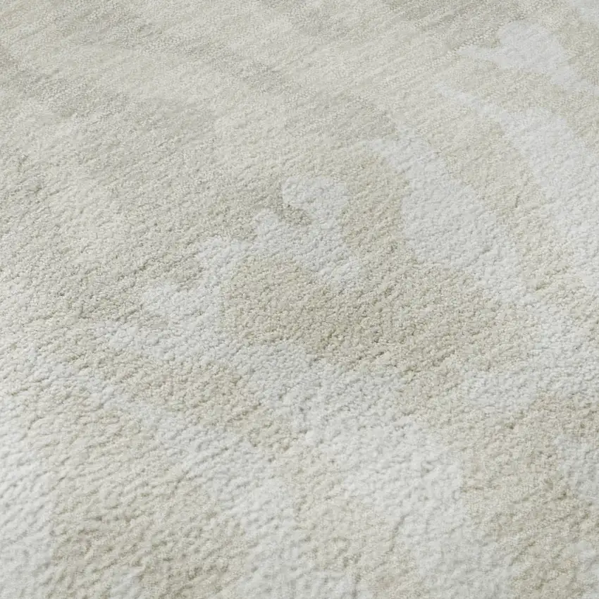 8' Ivory And Beige Animal Print Washable Round Rug With UV Protection Photo 9