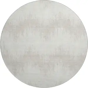Photo of 8' Ivory And Beige Chevron Washable Round Rug With UV Protection