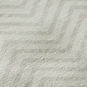 Photo of 8' Ivory And Beige Chevron Washable Round Rug With UV Protection