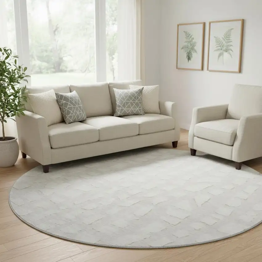 8' Ivory And Beige Cobblestone Washable Round Rug With UV Protection Photo 1