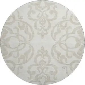 Photo of 8' Ivory And Beige Damask Washable Round Rug With UV Protection