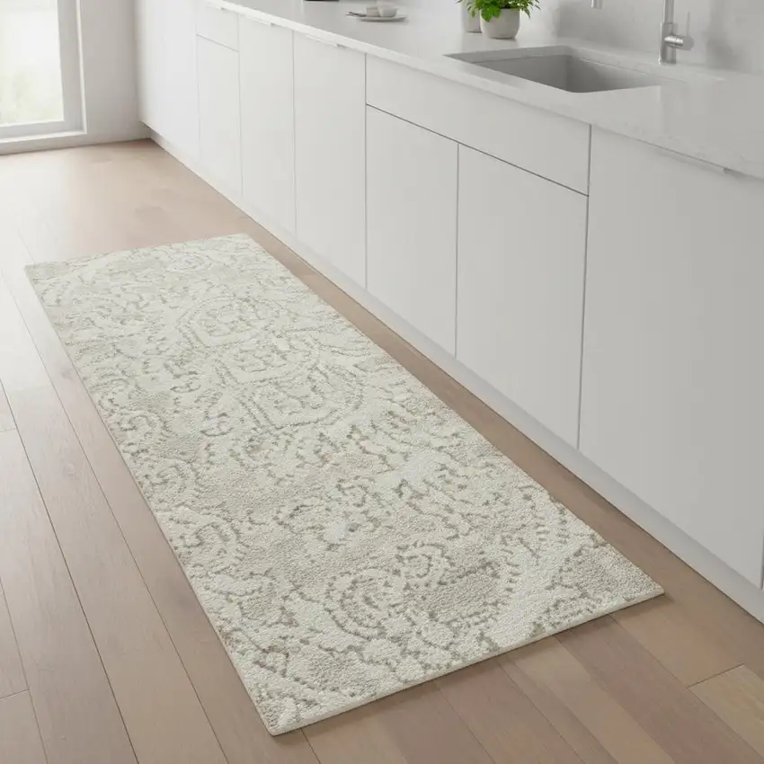 8' Ivory And Beige Floral Distressed Non Skid Runner Rug Photo 1