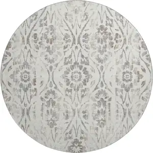 Photo of 8' Ivory And Beige Floral Washable Round Rug With UV Protection