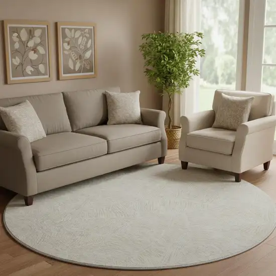 8' Ivory And Beige Floral Washable Round Rug With UV Protection Photo 1