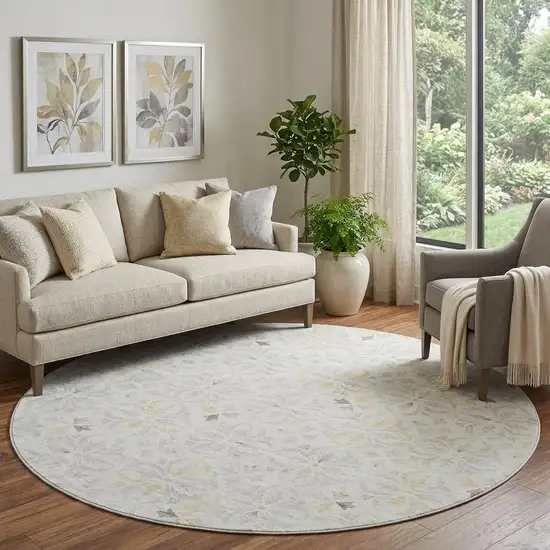 8' Ivory And Beige Floral Washable Round Rug With UV Protection Photo 1