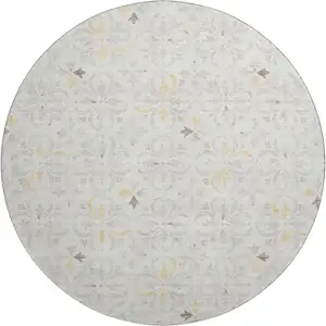 Photo of 8' Ivory And Beige Floral Washable Round Rug With UV Protection