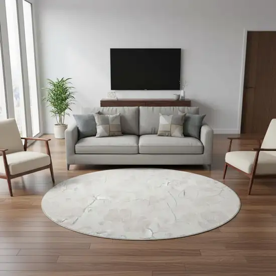 8' Ivory And Beige Floral Washable Round Rug With UV Protection Photo 2