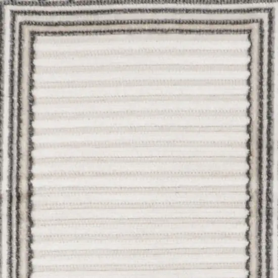 8' Ivory And Beige Geometric Indoor Outdoor Runner Rug Photo 2