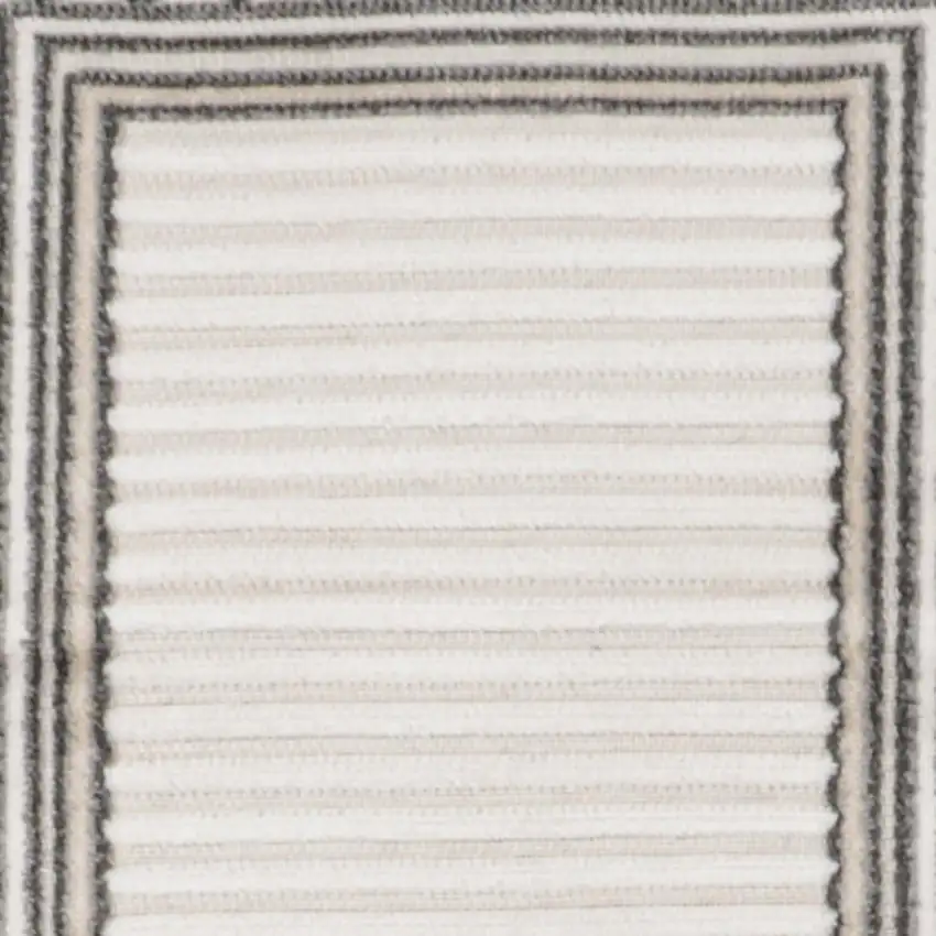 8' Ivory And Beige Geometric Indoor Outdoor Runner Rug Photo 2