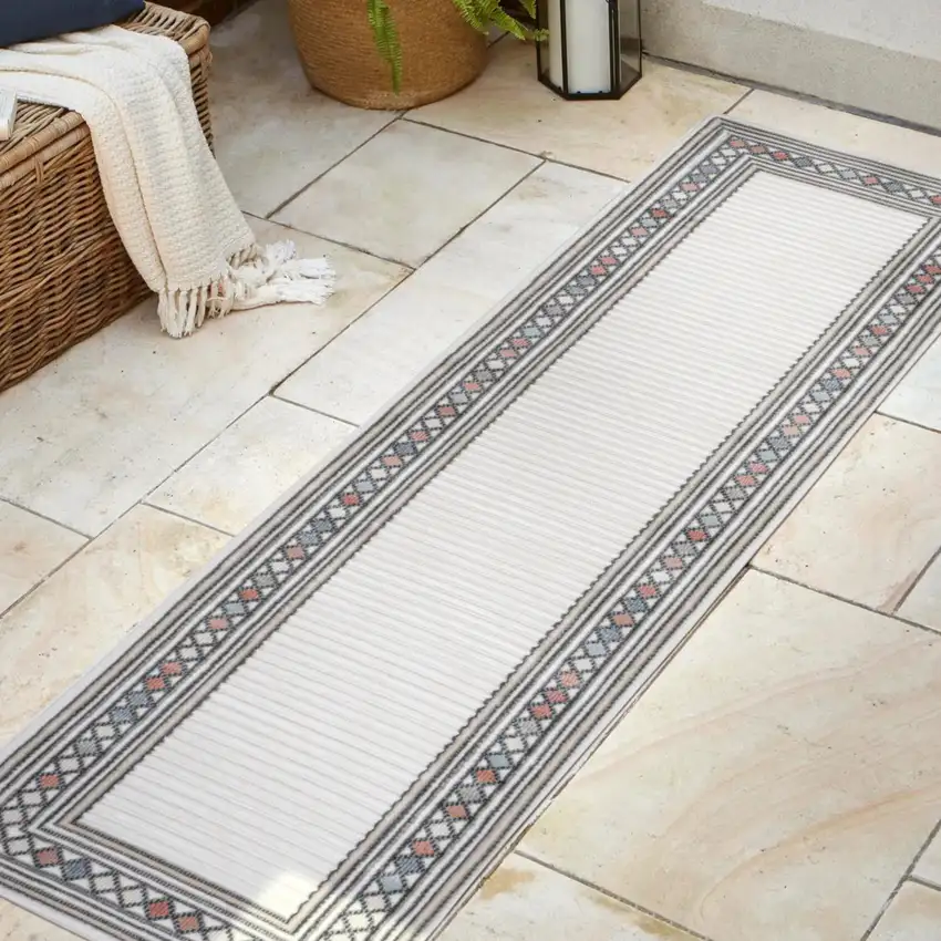 8' Ivory And Beige Geometric Indoor Outdoor Runner Rug Photo 4