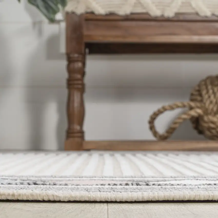 8' Ivory And Beige Geometric Indoor Outdoor Runner Rug Photo 6