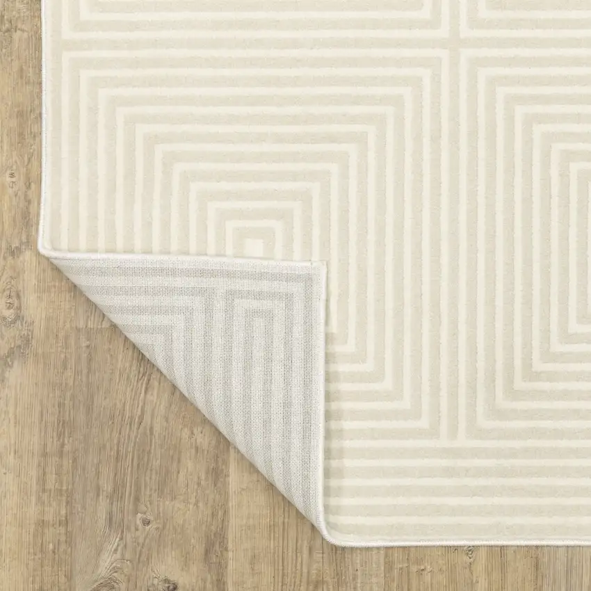 8' Ivory And Beige Geometric Runner Rug Photo 9