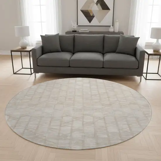 8' Ivory And Beige Geometric Washable Round Rug With UV Protection Photo 1