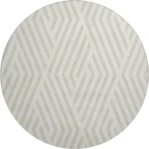 Photo of 8' Ivory And Beige Geometric Washable Round Rug With UV Protection