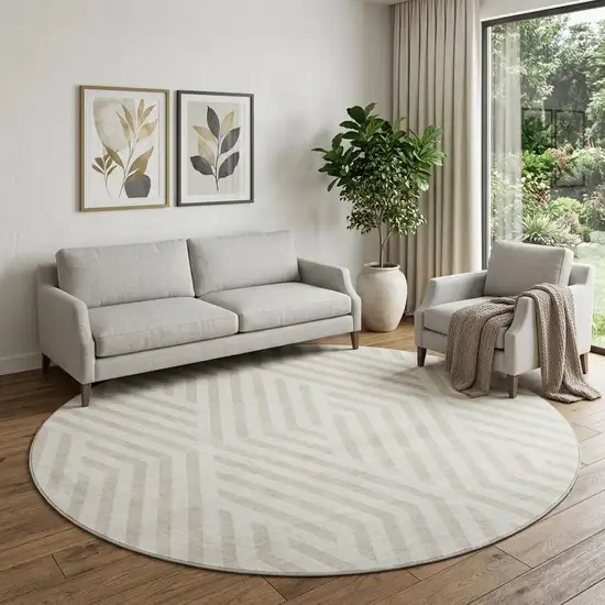 8' Ivory And Beige Geometric Washable Round Rug With UV Protection Photo 1