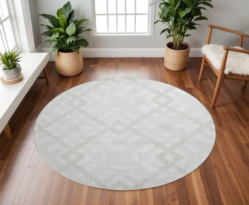 8' Ivory And Beige Geometric Washable Round Rug With UV Protection Photo 2