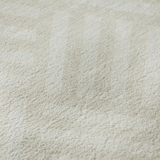 8' Ivory And Beige Geometric Washable Round Rug With UV Protection Photo 9