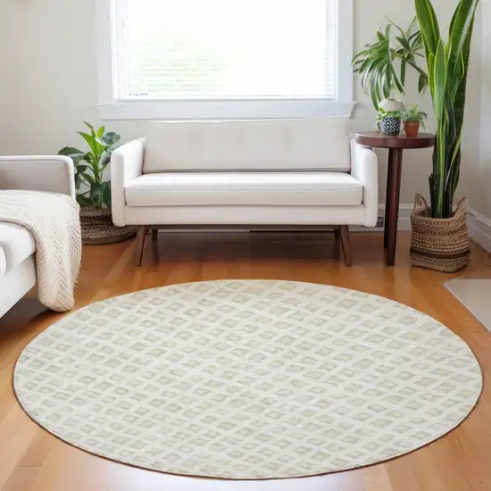 8' Ivory And Beige Geometric Washable Round Rug With UV Protection Photo 5