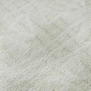 Photo of 8' Ivory And Beige Geometric Washable Round Rug With UV Protection