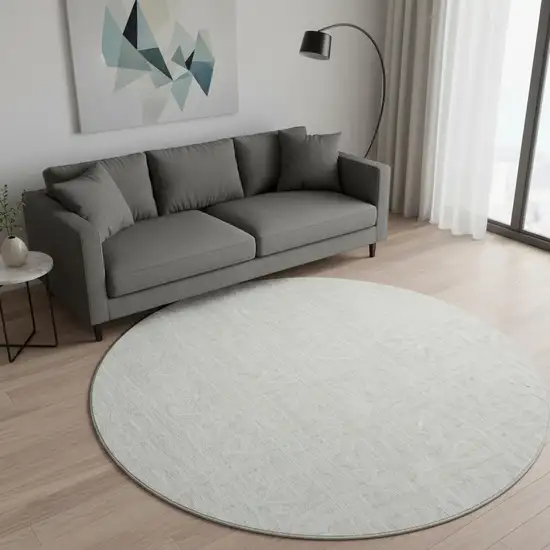 8' Ivory And Beige Geometric Washable Round Rug With UV Protection Photo 2