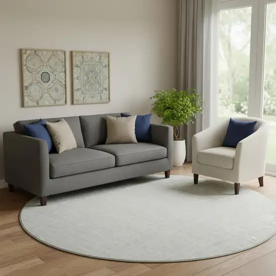 8' Ivory And Beige Geometric Washable Round Rug With UV Protection Photo 1