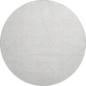 Photo of 8' Ivory And Beige Geometric Washable Round Rug With UV Protection