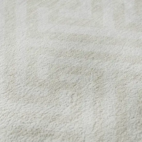 8' Ivory And Beige Geometric Washable Round Rug With UV Protection Photo 9