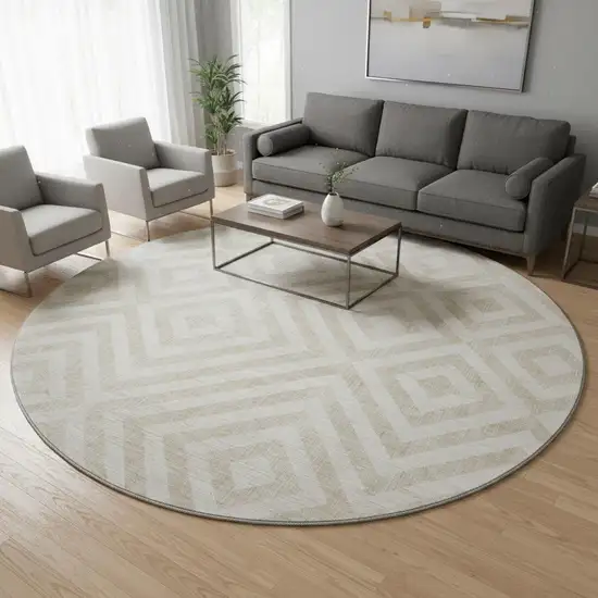8' Ivory And Beige Geometric Washable Round Rug With UV Protection Photo 2