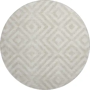 Photo of 8' Ivory And Beige Geometric Washable Round Rug With UV Protection